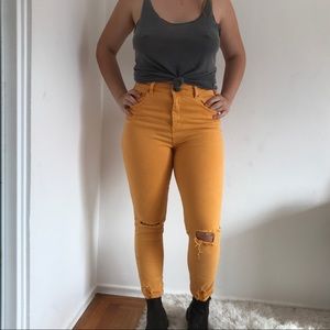 Yellow ripped jeans